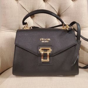 Prada small black/gold handbag. A++ Condition!